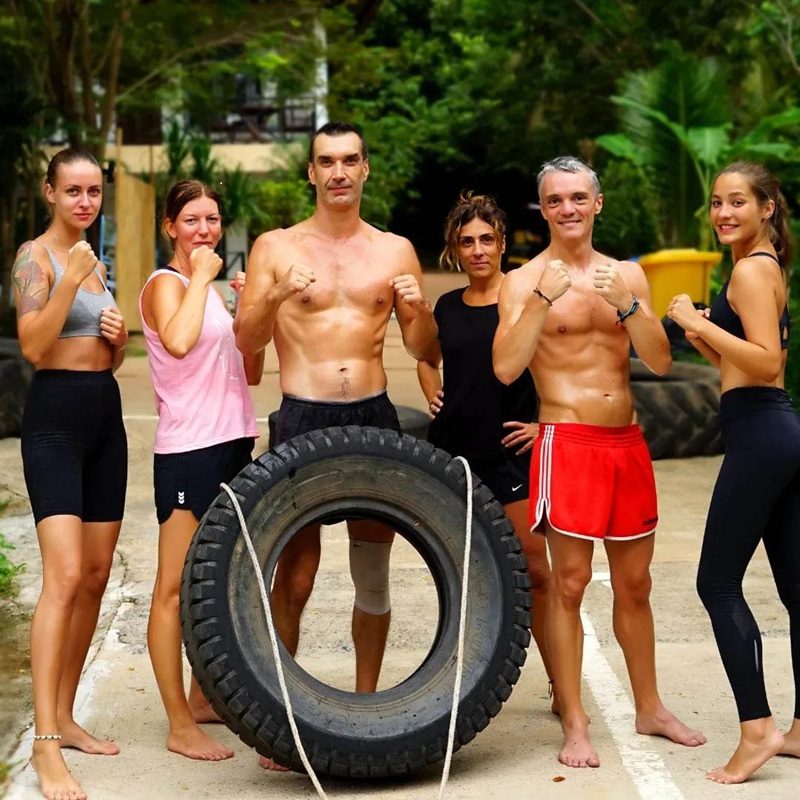 Outdoor fitness training in Koh Lanta with clients and trainer